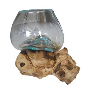 glass blown on driftwood